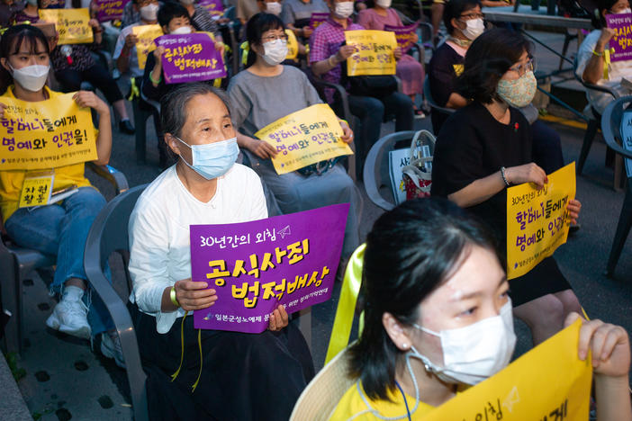 Hundreds of people gather for a rally to mark the International Memorial Day for Comfort Women on August 14, 2020 in Seoul, South Korea. A South Korean court recently ordered Japan to financially compensate 12 women forced into sexual slavery by the Japanese.