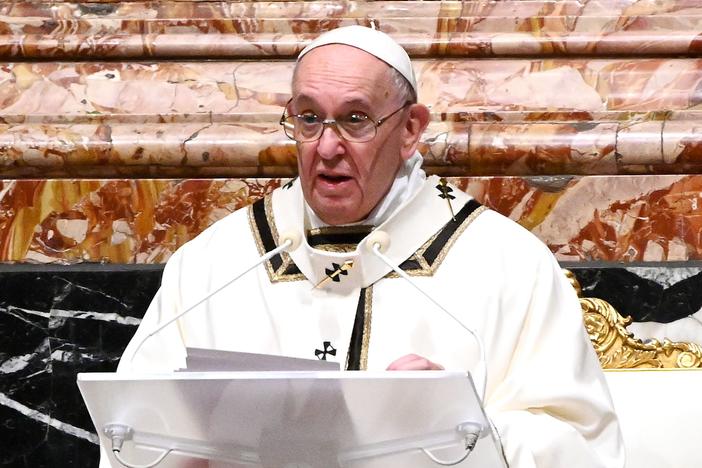 Pope Francis is seen giving a homily on Christmas Eve. Francis on Sunday condemned the violence at the U.S. Capitol and prayed for reconciliation.