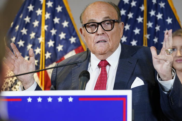 The New York State Bar Association is launching a "historic" inquiry into Trump attorney Rudy Giuliani, shown here at a November press conference in Washington, D.C.