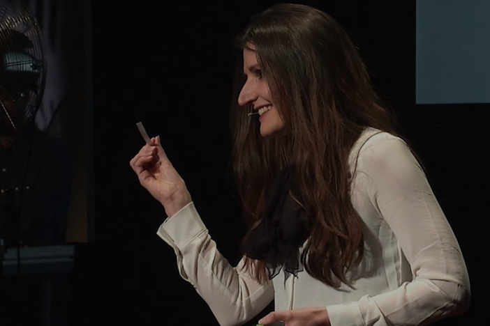 Caro Verbeek speaks on the TEDx stage in Gronigen, Netherlands.