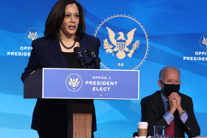 Vice President-elect Kamala Harris delivers remarks on Jan. 8 as President-elect Joe Biden looks on. The two are set to be inaugurated Wednesday at the U.S. Capitol.