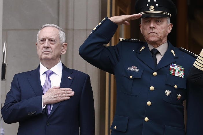 Former Defense Secretary Jim Mattis, left, and former Mexican Defense Secretary Gen. Salvador Cienfuegos Zepeda during an honor cordon at the Pentagon in 2017. Mexico cleared Cienfuegos of all charges related to drug trafficking on Thursday.