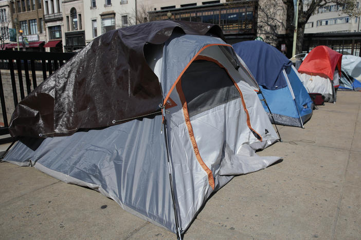 Tents of homeless people line a street in Washington, D.C., in April.