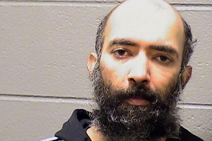 Aditya Singh, 36, is accused of hiding in a restricted area of the O'Hare International Airport in Chicago for three months. He was arrested Saturday after United Airlines staff said he possessed stolen airport credentials.