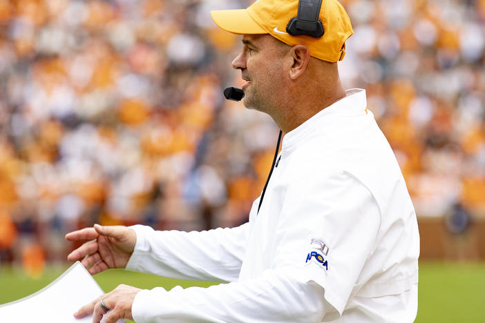 University of Tennessee head football coach Jeremy Pruitt directs players at a game on Oct. 12, 2019. University officials announced they will fire Pruitt and nine football team staff members after an investigation found a slew of likely NCAA violations.