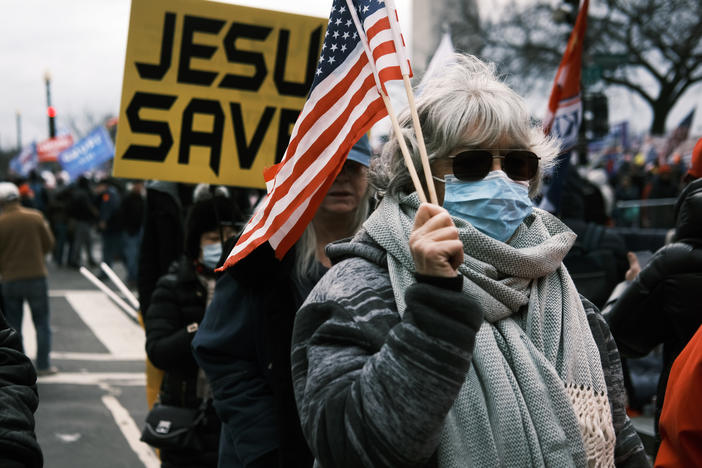 "JESUS SAVES" banners were among those carried during a rally on Jan. 6, 2021, in Washington before rioters stormed the Capitol.