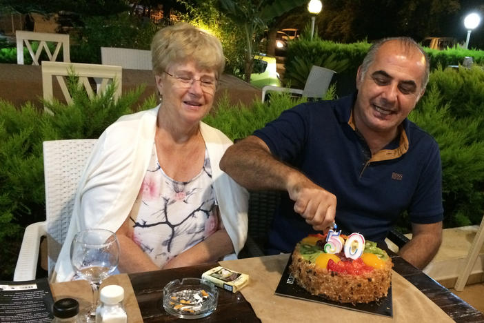 Pamela and Afshin Raghebi celebrate a birthday together. Afshin, who was born in Iran, has been stuck overseas, away from his U.S. citizen wife, for more than two years after he flew abroad for an interview at a U.S. Consulate as part of his green card application.