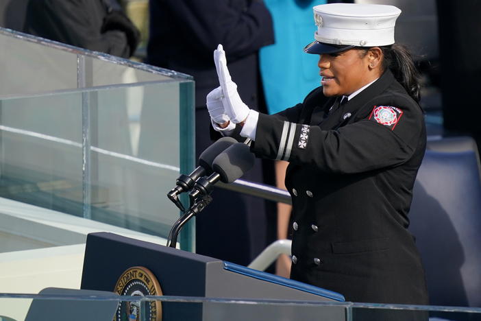 Capt. Andrea Hall, a firefighter from Fulton County, Ga., delivers the pledge of allegiance during the 59th Presidential Inauguration on Wednesday.