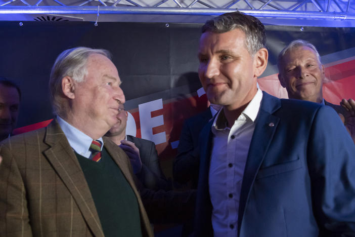 Alternative for Germany leaders Björn Höcke (right) and Alexander Gauland celebrate their party's election results in Erfurt, Germany, in 2019, when voters in Thuringia elected a new state parliament. The AfD now has 88 members in Germany's federal parliament, more than 12% representation.