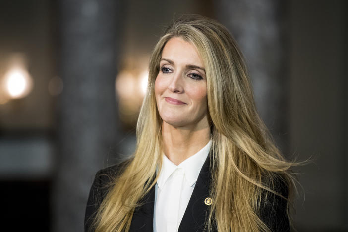 Sen. Kelly Loeffler, R-Ga., waits for Vice President Mike Pence to arrive for her swear-in reenactment for the cameras in the Capitol on Monday, Jan. 6, 2020.