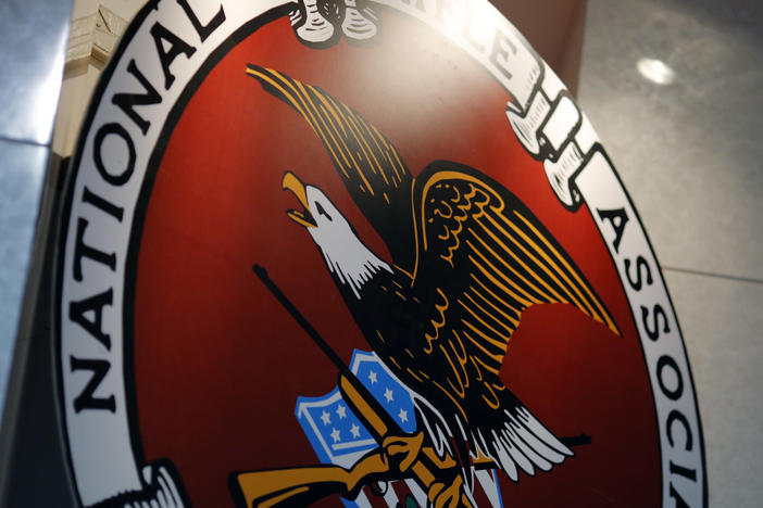 The logo of the National Rifle Association is seen at an outdoor sports trade show in 2017.