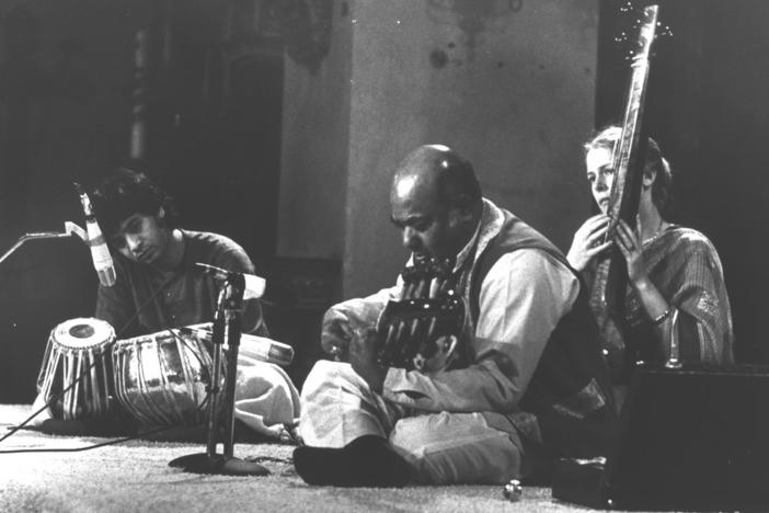 Tabla player Zakir Hussain (left) accompanies sarod player Ali Akbar Khan and his wife and collaborator Mary Khan.