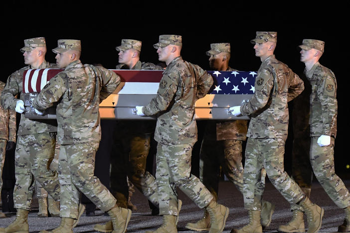 The remains of Lt. Col. Paul  Voss return home, Dover Air Force Base, Del. Voss was one of two Air Force aviators killed in a crash in Afghanistan last January.