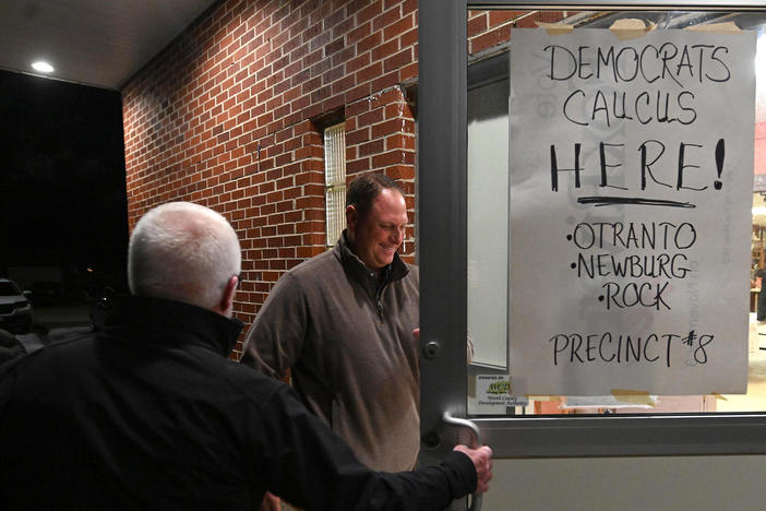 Voters head into their Iowa Democratic caucus site last year. Problems with a new smartphone app delayed reporting of the results for days or, for The Associated Press, permanently.