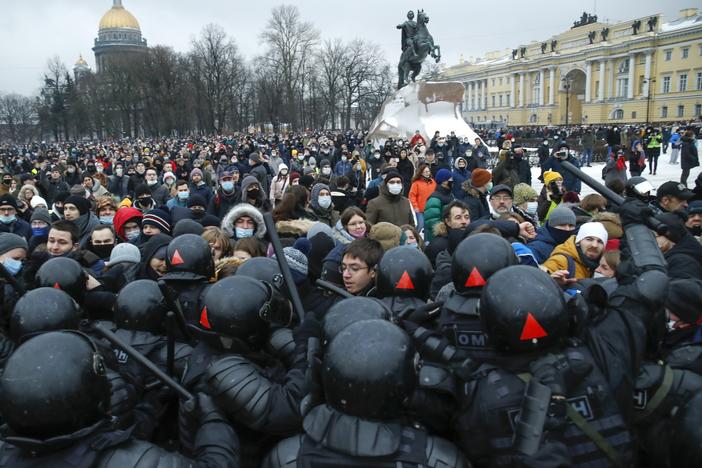 People clash with police Saturday during a protest in St. Petersburg, Russia, against the jailing of opposition leader Alexei Navalny.