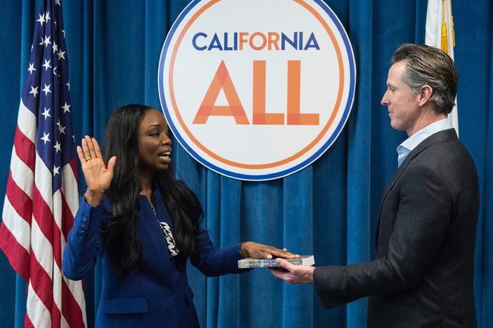 California's first surgeon general, Dr. Nadine Burke Harris, is sworn in by Gov. Gavin Newsom in February 2019. A leading voice on health care equity, she's helping shape the state's vaccination makeover following its rocky start.