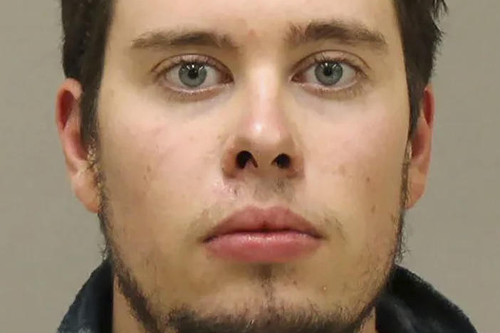 Ty Garbin, one of six defendants charged in an alleged plot to kidnap Michigan Gov. Gretchen Whitmer, appears at the time of his arrest in October. Garbin pleaded guilty to a single count of kidnapping conspiracy.