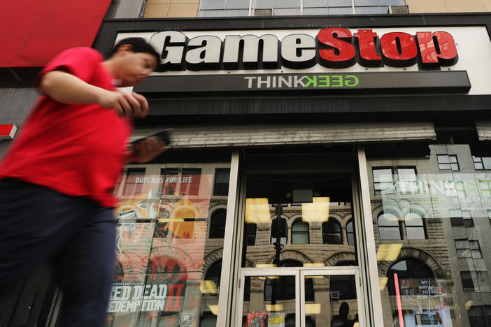 Video game retailer GameStop has seen its stock soar, driven higher by a group of amateur day traders on Reddit, who are taking on Wall Street hedge funds. The frenzy has gotten the attention of regulators and lawmakers.
