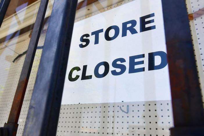 The U.S. economy slowed sharply in the last three months of the year from the previous quarter as the pandemic made a resurgence and businesses had to close.