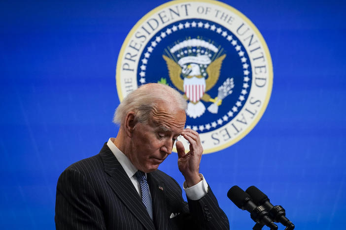 President Biden pauses while speaking after signing an executive order related to manufacturing, at the White House on Monday. Biden is off to a fast start but is running into resistance in Congress.