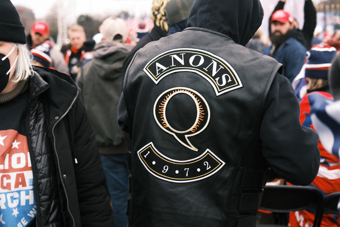 A QAnon supporter attends the Jan. 6 "Stop the Steal" rally in Washington, D.C., after which supporters of President Donald Trump stormed the U.S. Capitol.