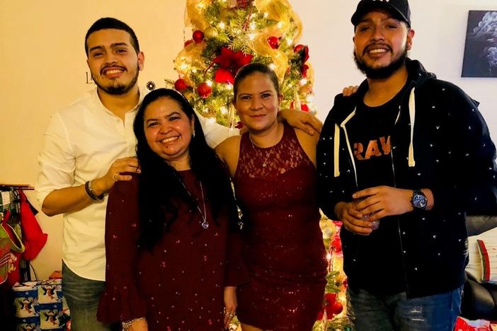 Javier Maradiaga (far right) with his brother, Jason Castillo; mother, Alma Maradiaga; and sister, Dariela Moncada on Christmas Eve in 2017.