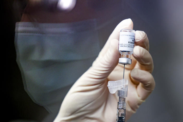 Pharmacy technician Sara Berech prepared a dose of the Johnson & Johnson COVID-19 vaccine in December for a clinical trial that includes Rocky Mountain Regional VA Medical Center in Aurora, Colo.