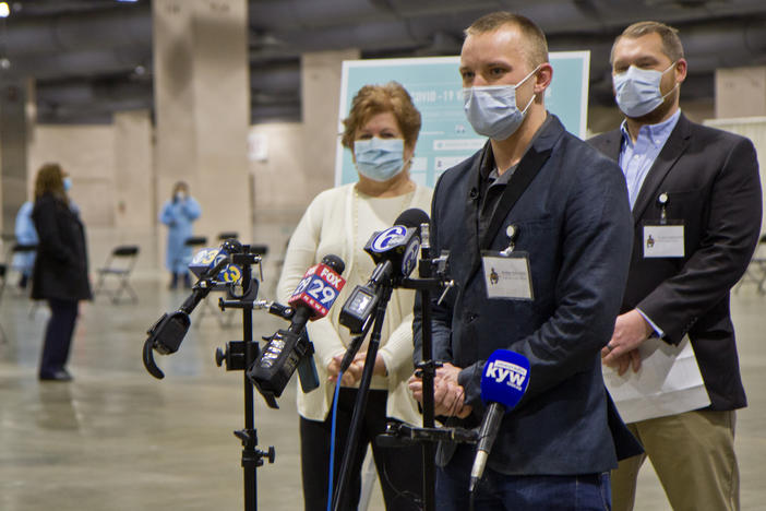 Andrei Doroshin, CEO of Philly Fighting Covid, speaks to reporters before the start of a COVID-19 vaccine clinic at the Pennsylvania Convention Center on Jan. 8.