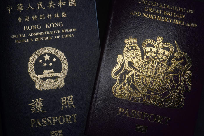 A British National Overseas passport (right) and China's Hong Kong Special Administrative Region passport. China said Friday it will no longer recognize the BNO passport as a valid travel document or form of identification.