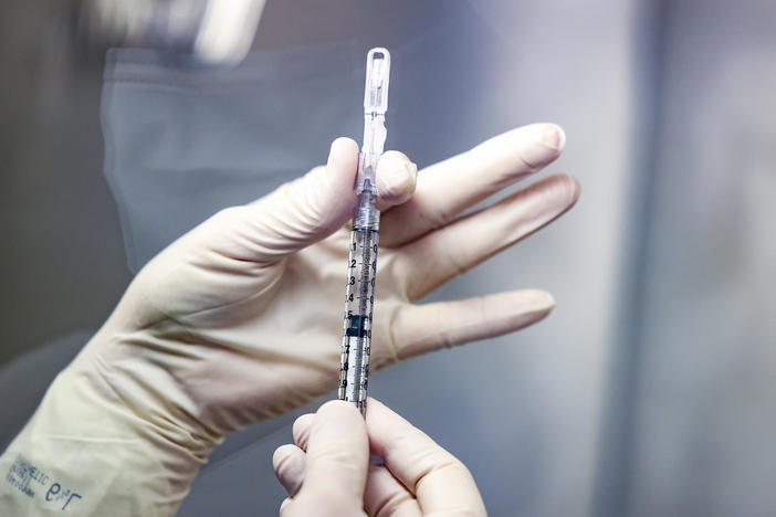 The Johnson & Johnson COVID-19 vaccine, pictured in December, is 66% effective at preventing moderate and severe disease. But Dr. Paul Stoffels of Johnson & Johnson says what matters more is preventing hospitalizations and deaths, which it did completely.