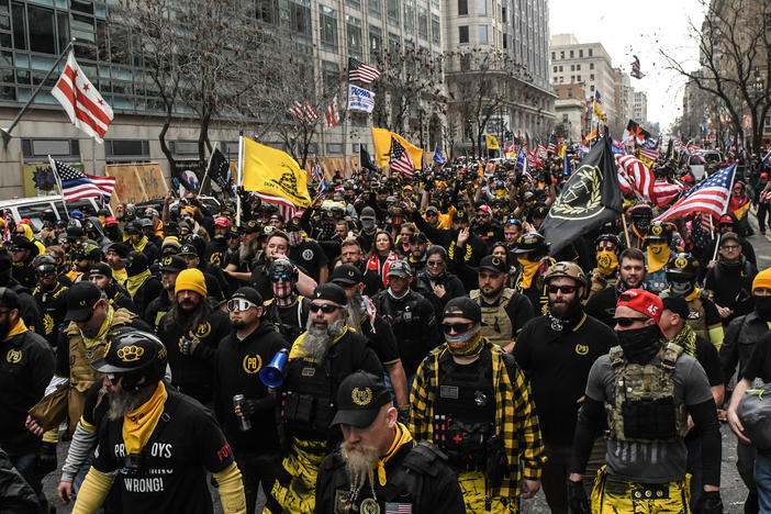 Members of the Proud Boys march toward Freedom Plaza during a protest in December 2020 in Washington, D.C. The Proud Boys has been designated as a hate group by the Southern Poverty Law Center.