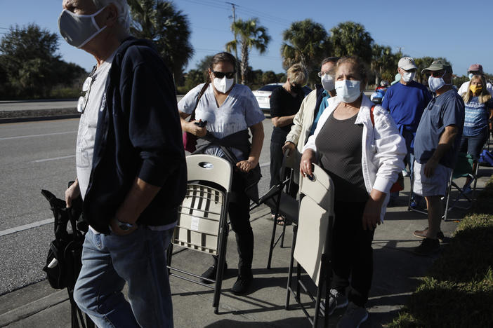 Long lines and computer isues are making it more difficult for some people to get the vaccine. These Floridians hope to snag one of 800 doses available at a vaccine site in Fort Myers.