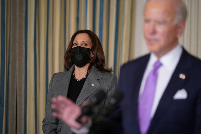 Vice President Harris listens as President Biden speaks on racial equity before signing executive orders at the White House on Jan. 26, part of a largely traditional public role she has played since taking office two weeks ago.