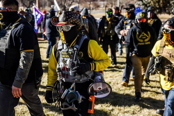 Public Safety Canada notes that last month, members of the Proud Boys "played a pivotal role in the insurrection at the U.S. Capitol." Here, Proud Boys members join Donald Trump supporters at a protest outside the Colorado State Capitol last month in Denver.
