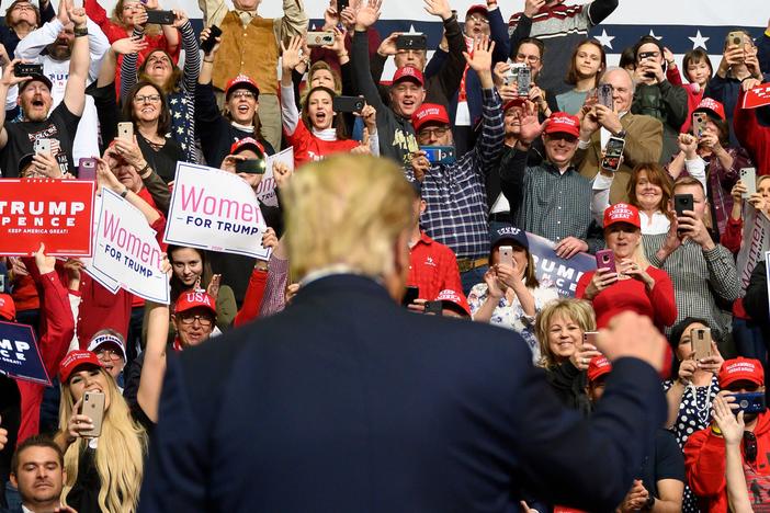 Supporters cheer as former President Trump arrives to address a "Keep America Great" rally in Colorado Springs, Colo., on Feb. 20, 2020. After his loss, the county GOP faces a deep ideological divide.