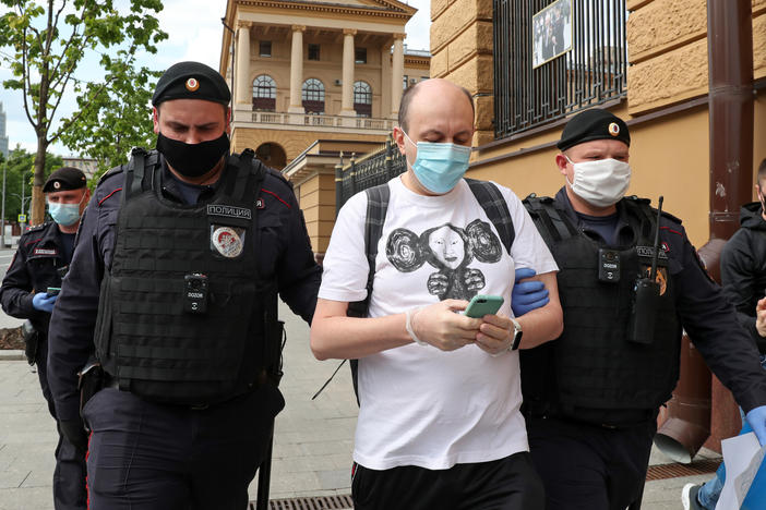 Sergei Smirnov, pictured being detained at a "solo protest" in May 2020, was sentenced to 25 days in jail on Wednesday for allegedly calling on people to protest through a Twitter repost.