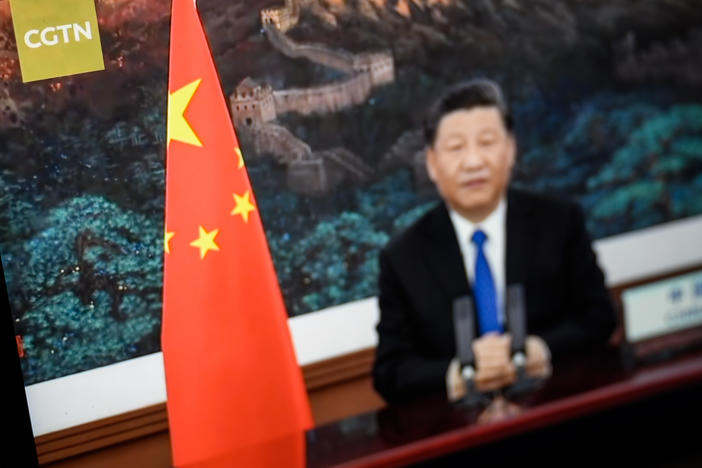 President Xi Jinping of China is seen on a CGTN archive program as it plays on a computer monitor in London. The U.K.'s Ofcom says Star China Media Limited, which holds the license for China Global Television Network (CGTN) doesn't have day-to-day editorial control over the channel, which is against its rules.