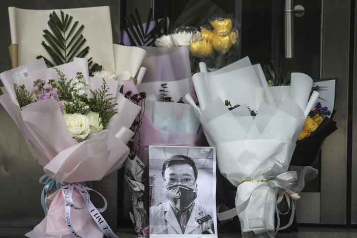 A portrait of the late Dr. Li Wenliang at his hospital in Wuhan, China. Li was a whistleblower in the early days of the country's coronavirus pandemic and died of COVID-19 on Feb. 7, 2020.