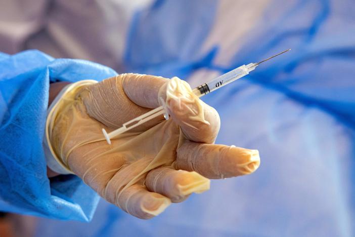 A Moroccan nurse holds a syringe containing a dose of the COVID-19 vaccine on Jan. 29. Morocco is one of the many countries that will receive COVID-19 doses as part of the COVAX initiative.