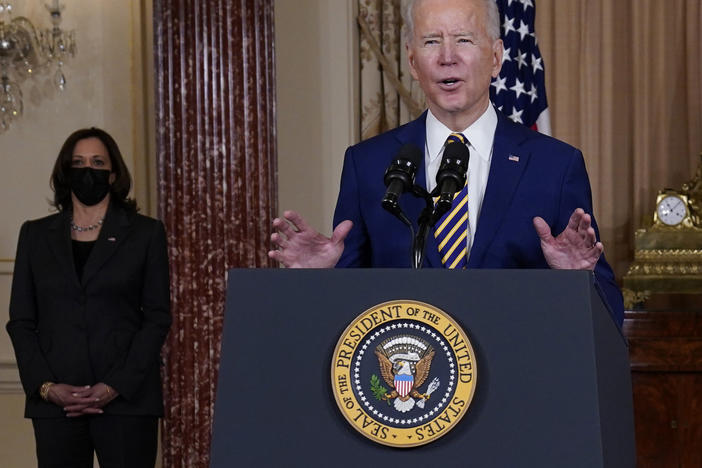 President Biden speaks at the State Department on Feb. 4 as Vice President Kamala Harris looks on. "We've elevated the status of cyber issues within our government," said Biden, whose administration is investigating a major cyber breach blamed on Russia.