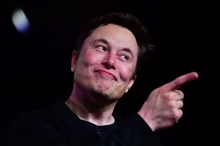 Tesla CEO Elon Musk speaks during the unveiling of the new Tesla Model Y in Hawthorne, Calif., on March 14, 2019. Tesla announced on Monday it would invest $1.5 billion in cryptocurrency Bitcoin.