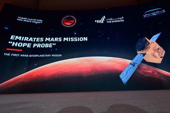 A picture taken on July 19, 2020, shows a screen broadcasting the launch of the "Hope" Mars probe at the Mohammed Bin Rashid Space Centre in Dubai. "Hope" — Al-Amal in Arabic — is expected to start orbiting Mars this week, marking the 50th anniversary of the unification of the UAE.