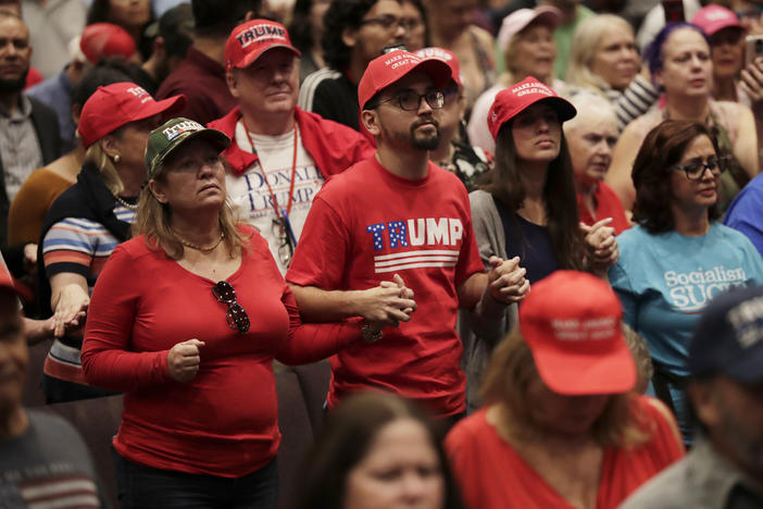 Supporters of President Donald Trump pray during a Jan. 3 rally for evangelical supporters at the King Jesus International Ministry church in Miami.