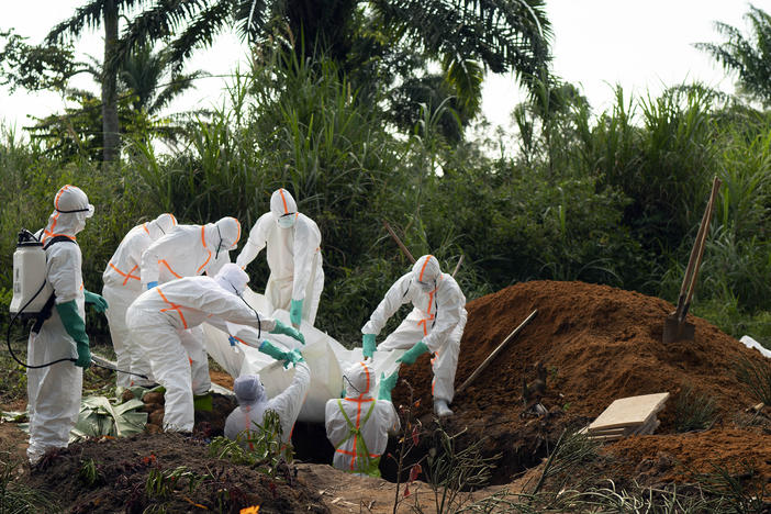 The Democratic Republic of Congo saw the end of its second-worst Ebola outbreak in June. More than 2,000 people died in that outbreak. Burial workers, seen above in 2019, follow safe burial practices to mitigate the spread of the virus.