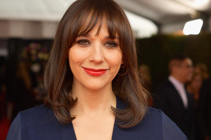 Rashida Jones says that growing up with two famous parents (Quincy Jones and Peggy Lipton) gave her a "very healthy perspective on fame." She's pictured above at the 2019 Annual Grammy Awards in Los Angeles, Calif.