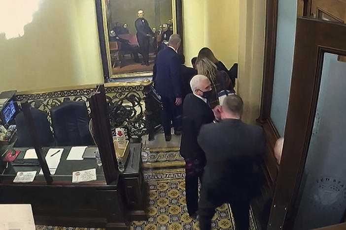 A security video shows then-Vice President Mike Pence being evacuated as rioters breach the Capitol on Jan. 6.