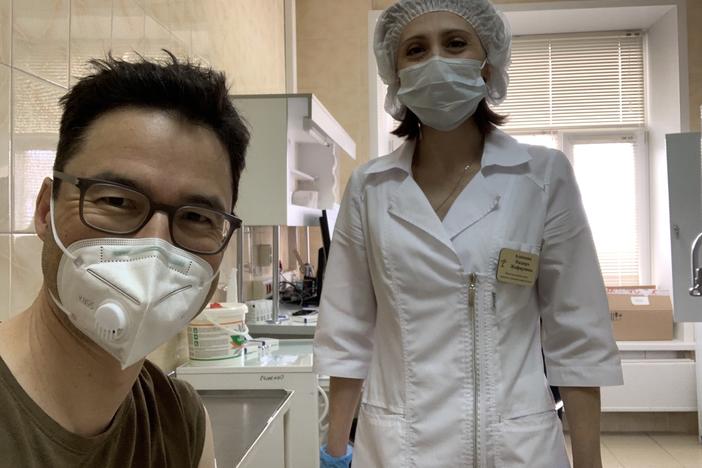 This week NPR Moscow correspondent Lucian Kim got vaccinated with Sputnik V, the COVID-19 vaccine that Russian President Vladimir Putin is promoting as the best in the world. Above: Kim smiles (behind his mask) after his shot.