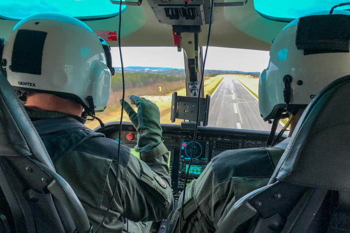 Pilots Jerry Griffin (L) of the Birmingham Police Department and Jonathan Johnson of the Jefferson County Sheriff's Office conduct a helicopter training flight using new virtual reality technology.