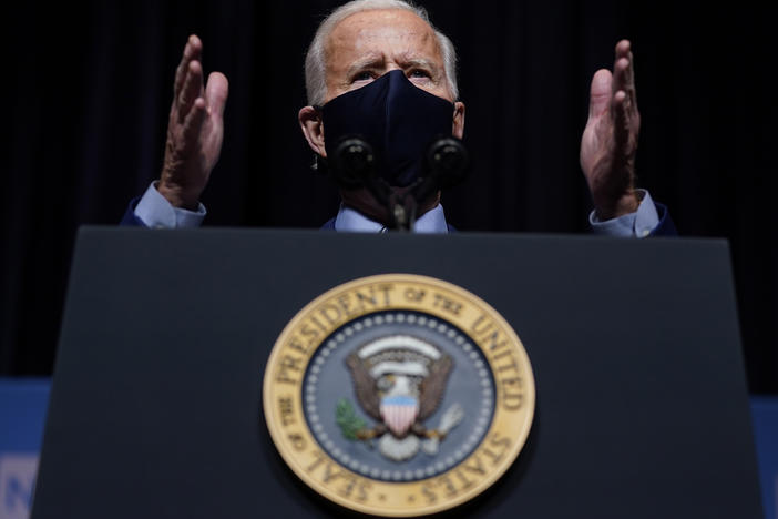 President Biden said the attack on the Capitol "has reminded us that democracy is fragile." Above, Biden speaks during a visit Thursday to the National Institutes of Health in Bethesda, Md.