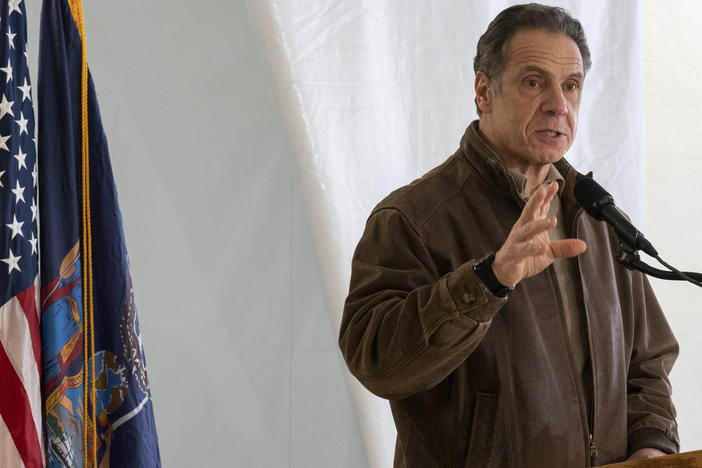 New York Gov. Andrew Cuomo speaks to reporters during a news conference at a COVID-19 pop-up vaccination site in Brooklyn on Jan. 23. Cuomo has defended the state's reporting of nursing home deaths.